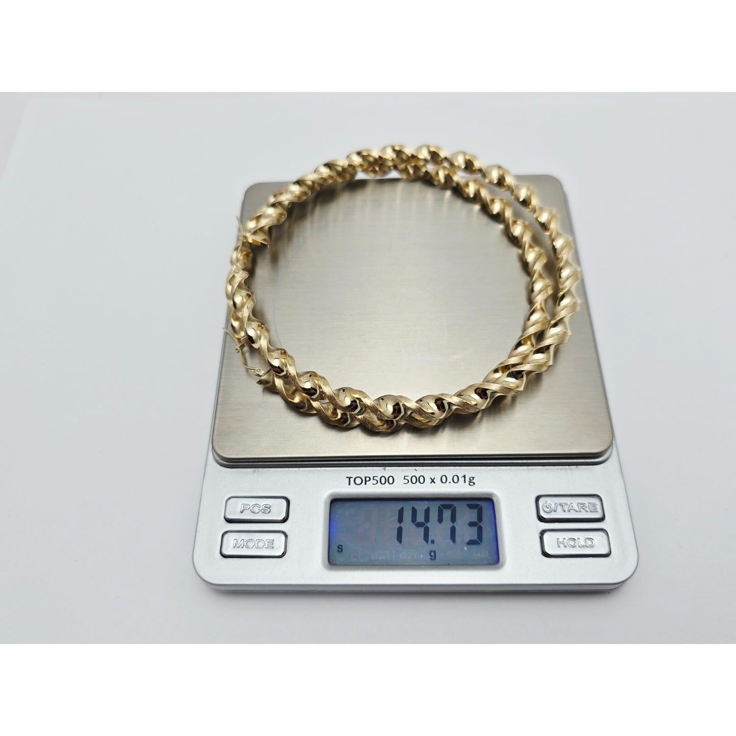 Large 10K Yellow Gold Spiral Tube Hoop Earrings