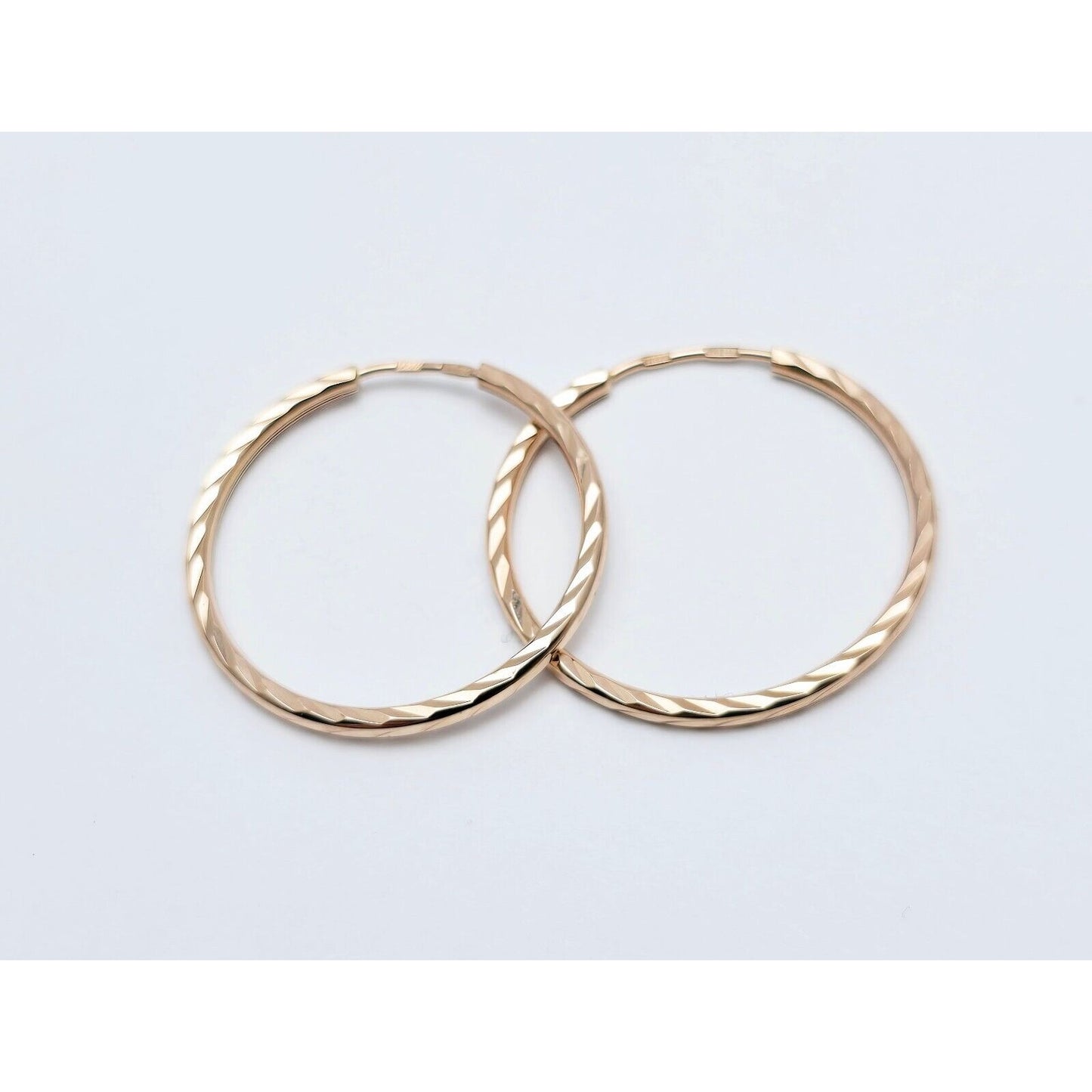 14K Rose Gold Diamond Cut Spiral Tube Hoop Earrings