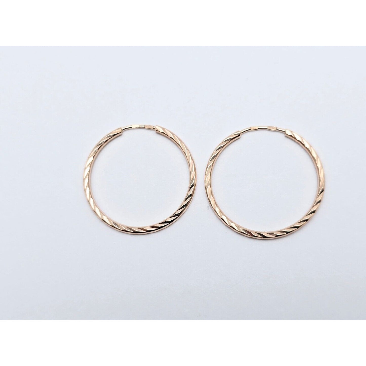 14K Rose Gold Diamond Cut Spiral Tube Hoop Earrings
