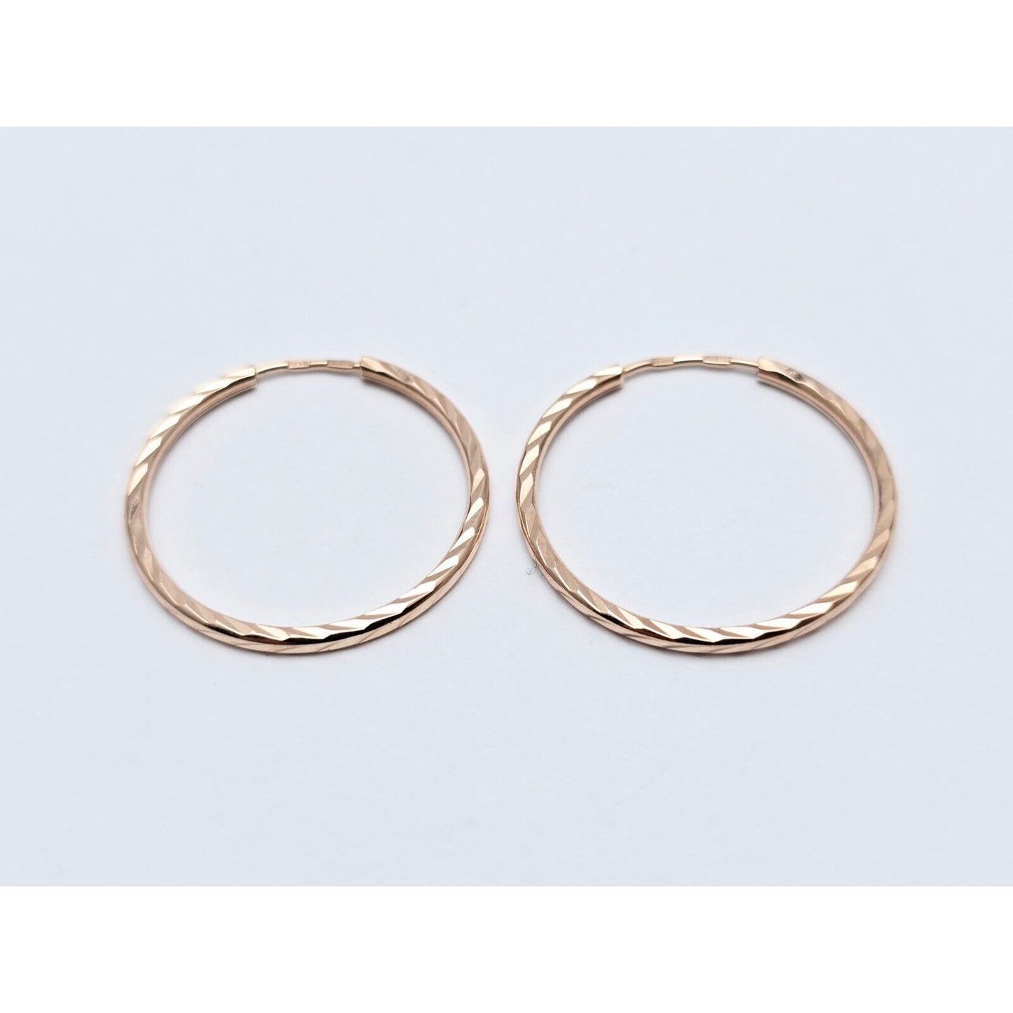 14K Rose Gold Diamond Cut Spiral Tube Hoop Earrings