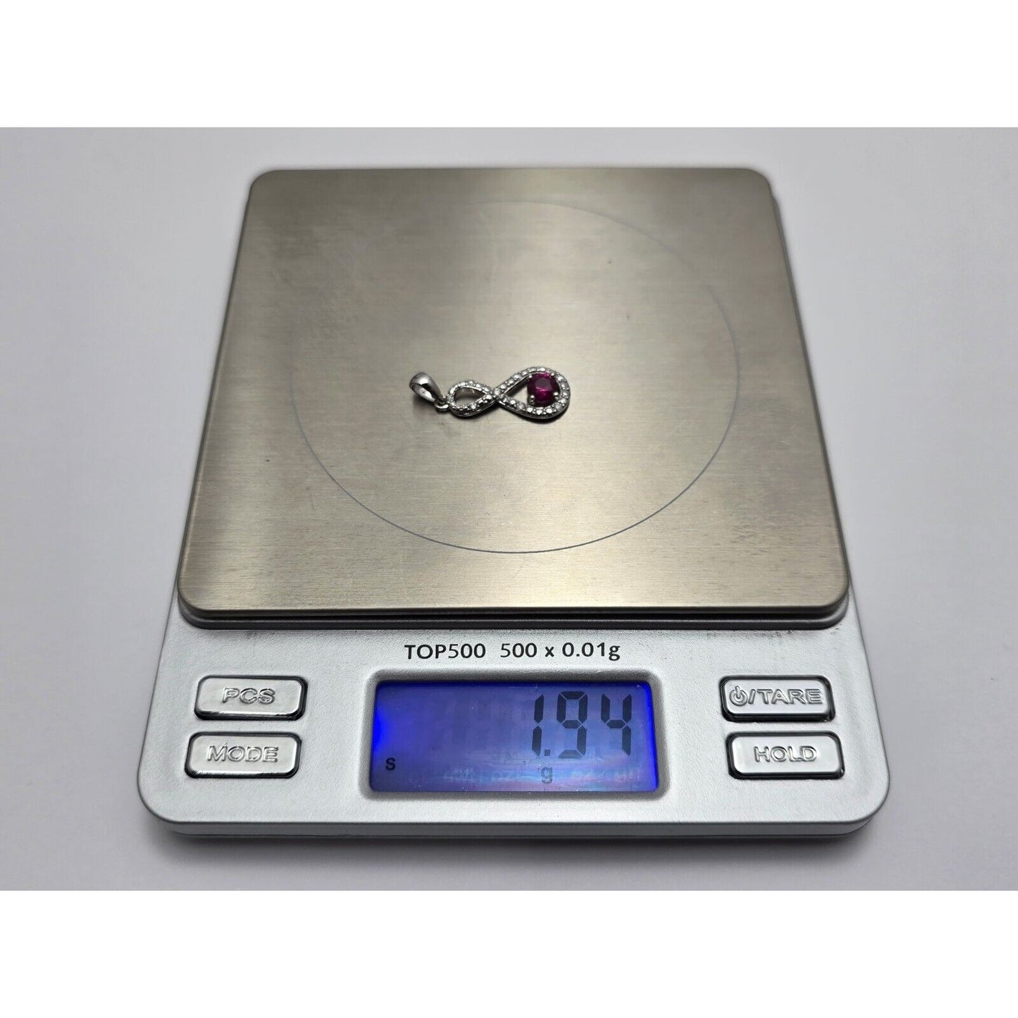 10K White Gold Diamond & Ruby Infinity Charm Pendant