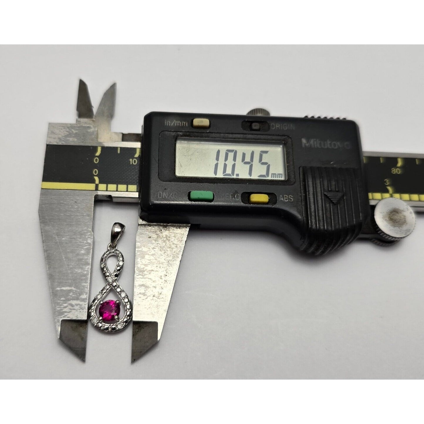 10K White Gold Diamond & Ruby Infinity Charm Pendant