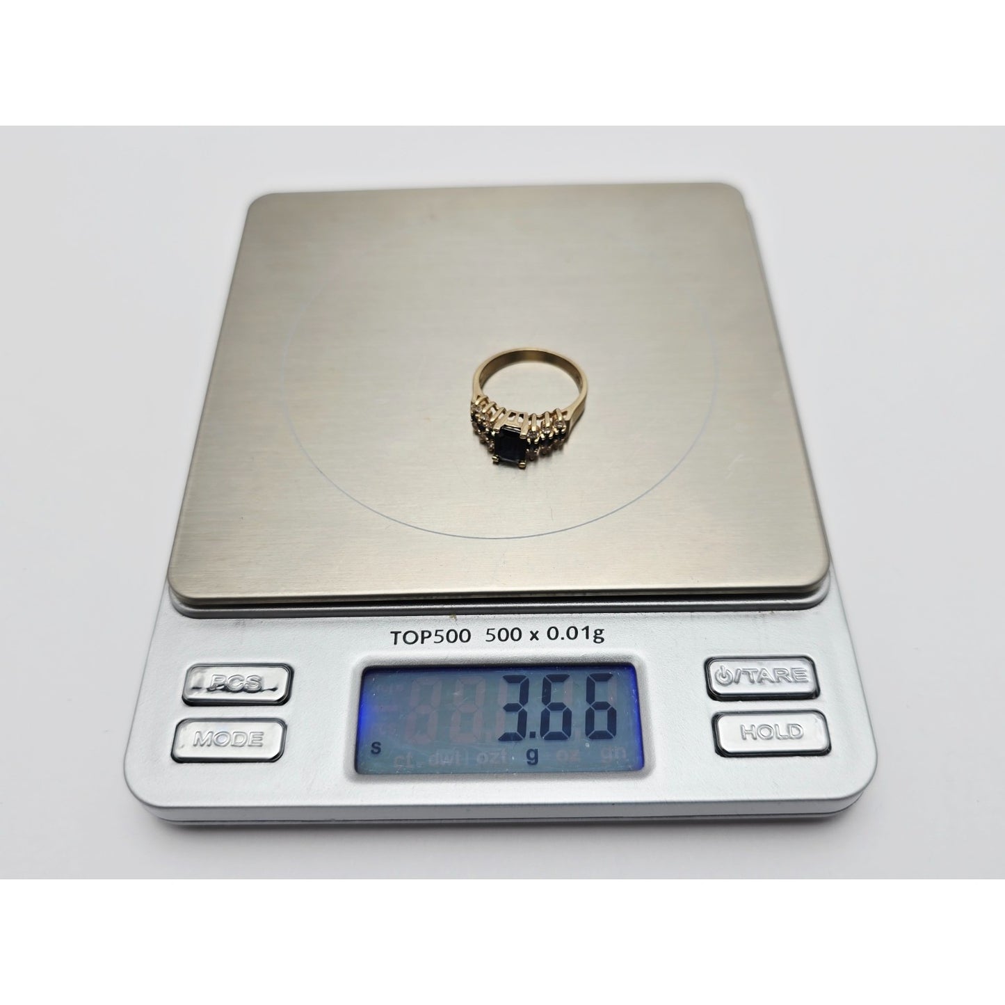 14K Yellow Gold Emerald Cut Sapphire & Round Diamond Ring