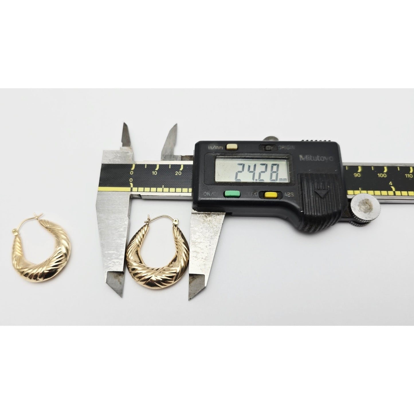 Medium 10K Yellow Gold Tapered Oval Hoop Earrings