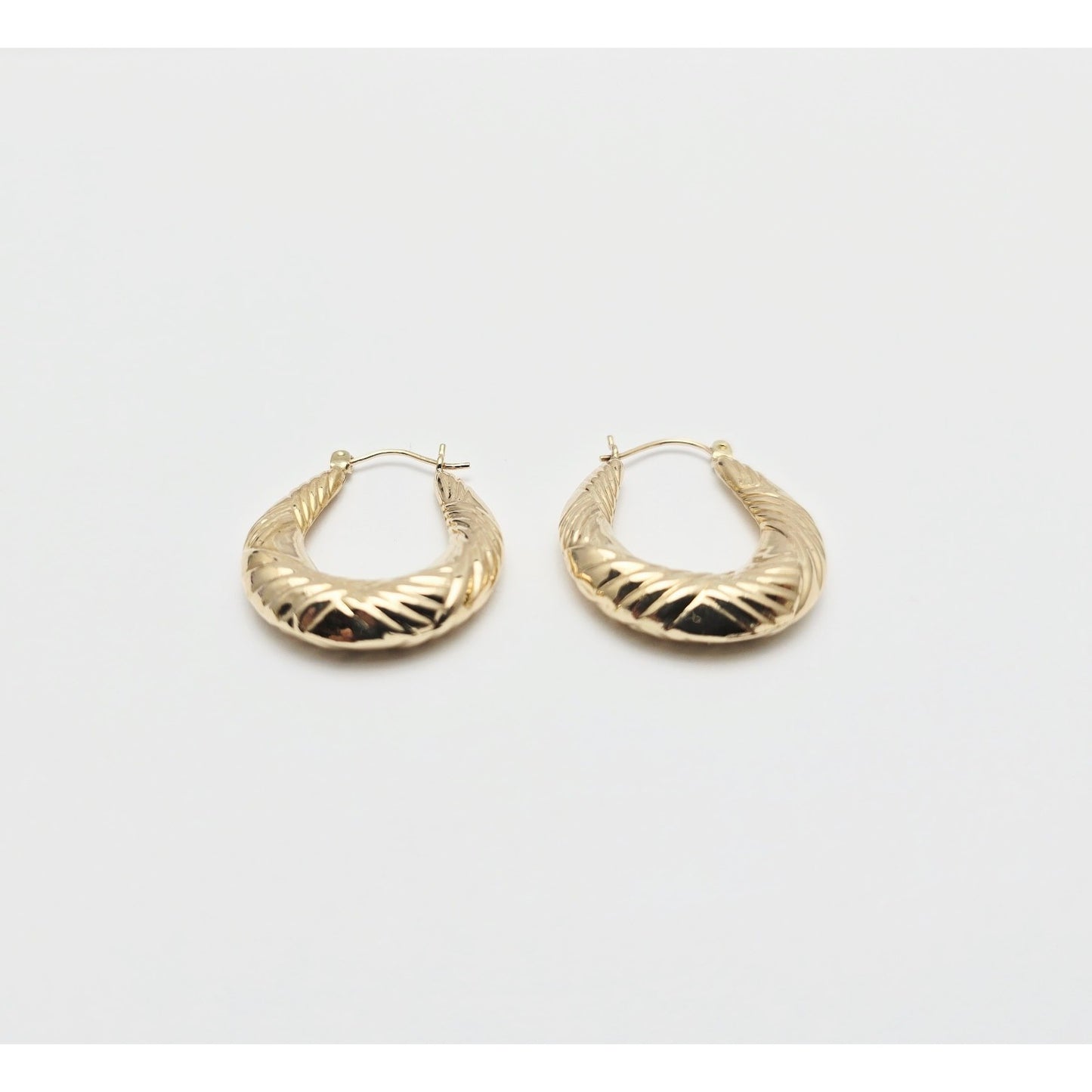 Medium 10K Yellow Gold Tapered Oval Hoop Earrings