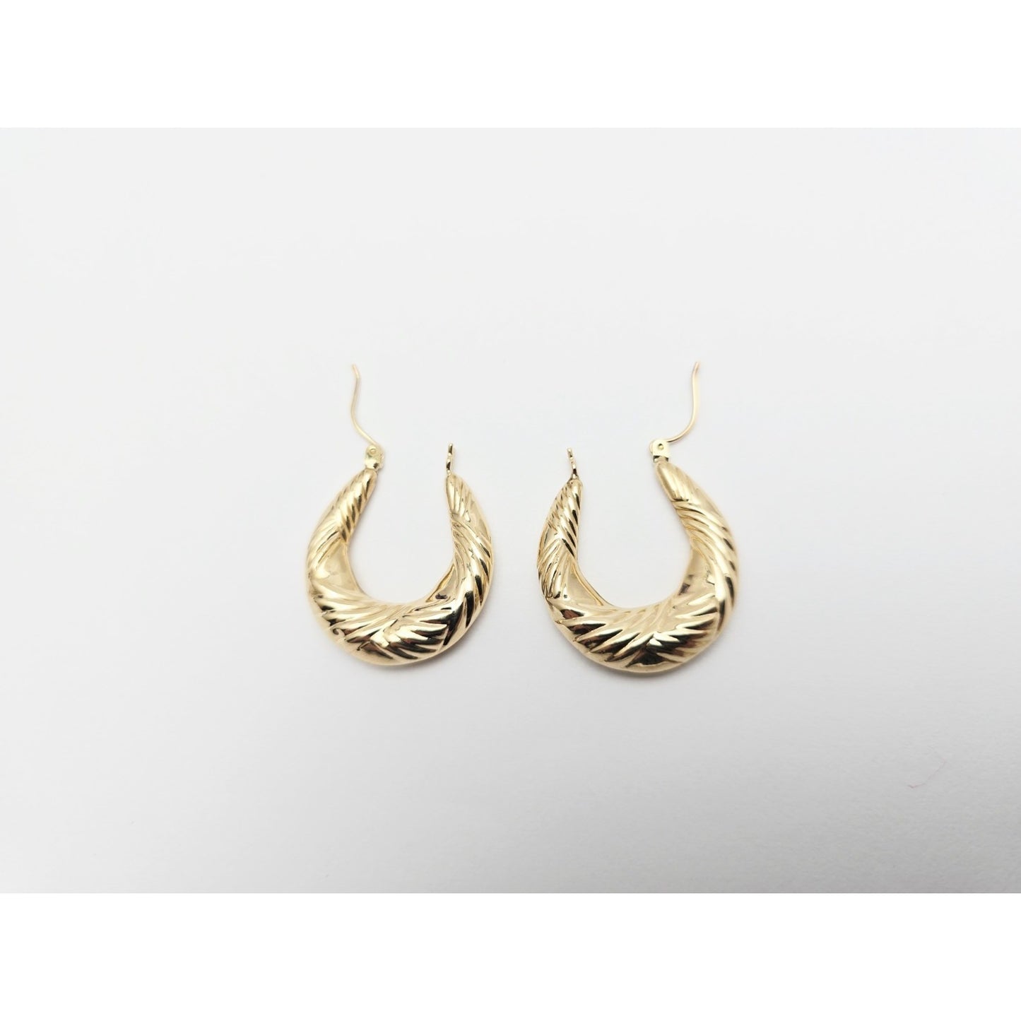 Medium 10K Yellow Gold Tapered Oval Hoop Earrings