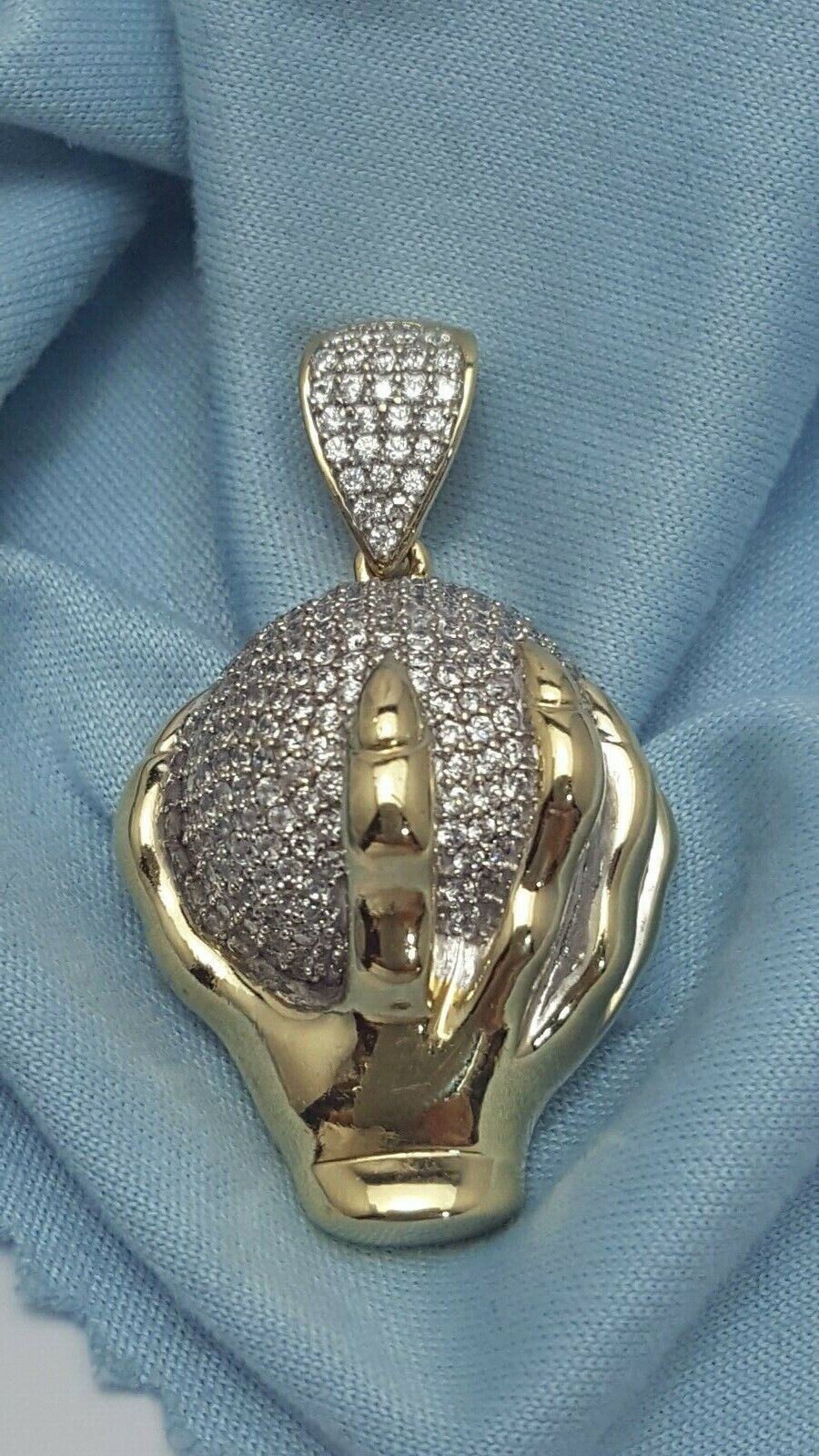 10K Yellow Gold Hand Holding Globe World Cubic Zirconia Charm Pendant