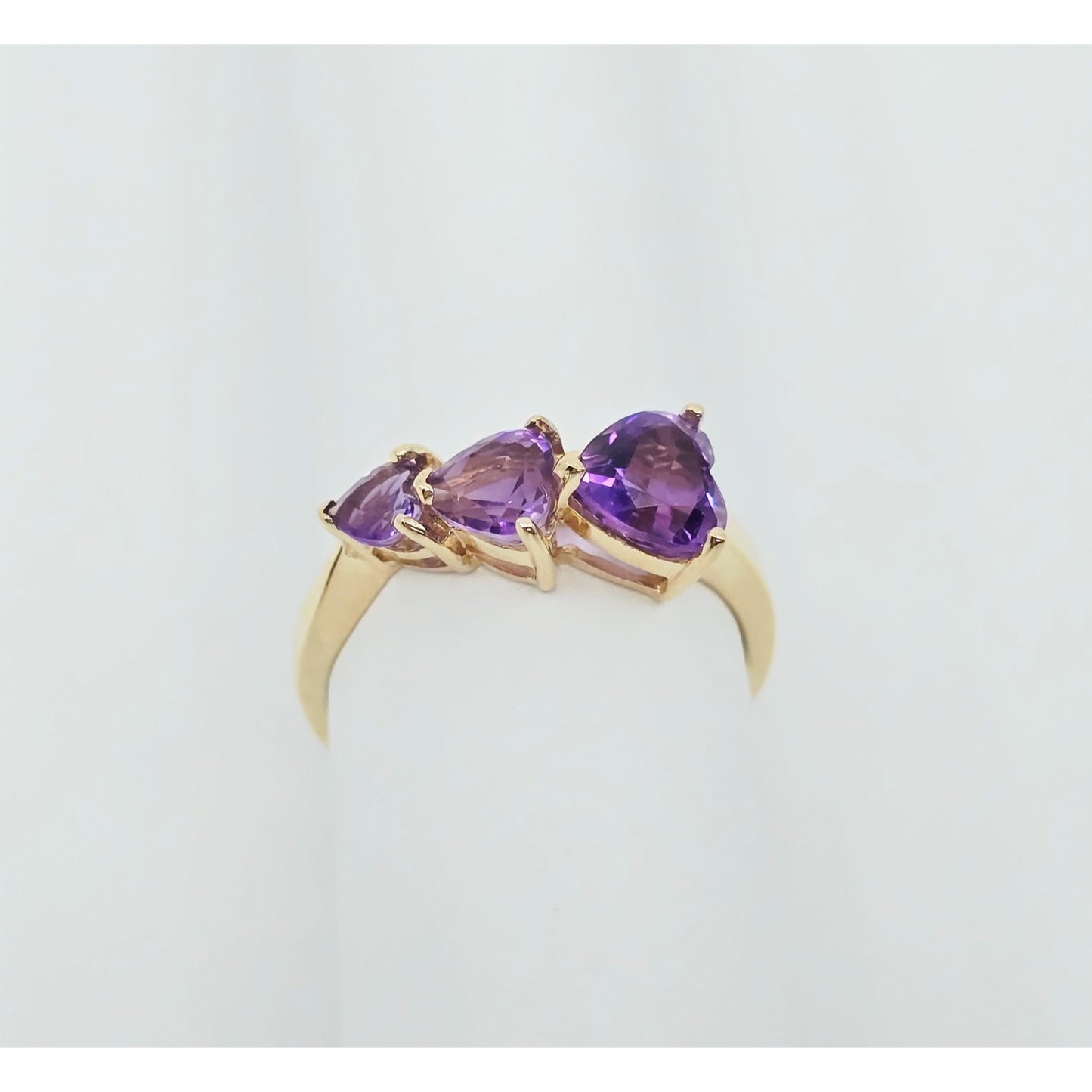10K Yellow Gold Graduated Heart Shaped Amethyst Ring