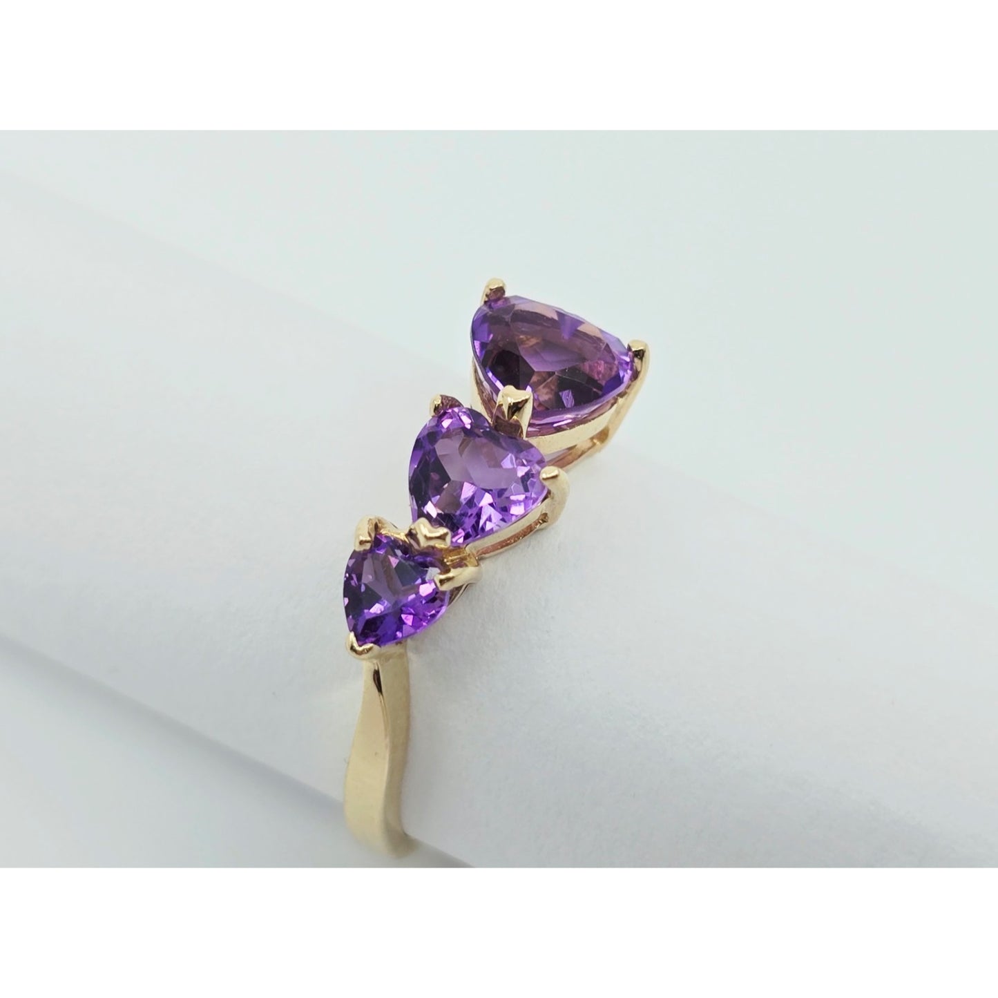 10K Yellow Gold Graduated Heart Shaped Amethyst Ring