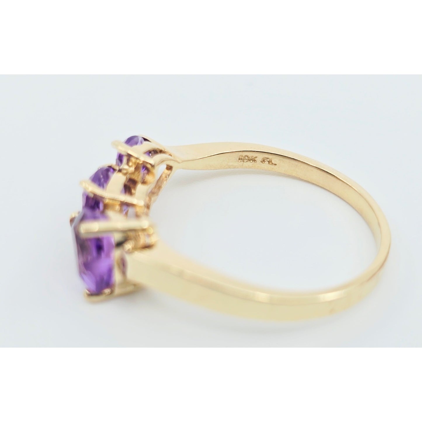 10K Yellow Gold Graduated Heart Shaped Amethyst Ring