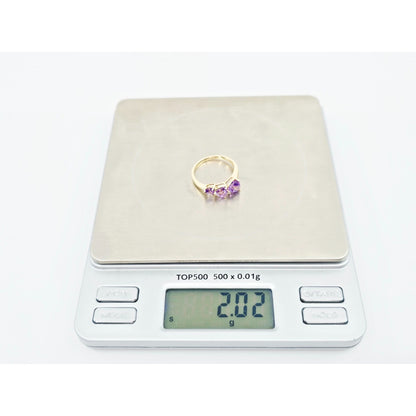 10K Yellow Gold Graduated Heart Shaped Amethyst Ring