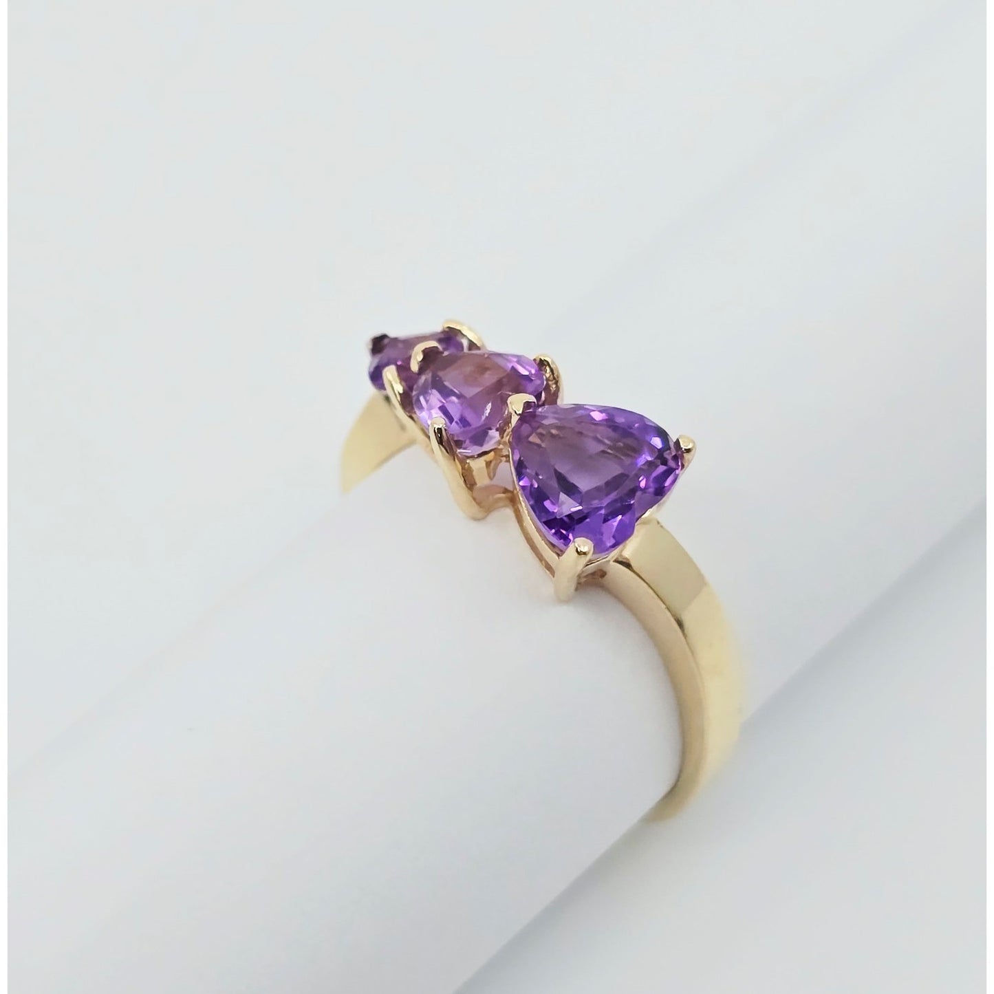 10K Yellow Gold Graduated Heart Shaped Amethyst Ring