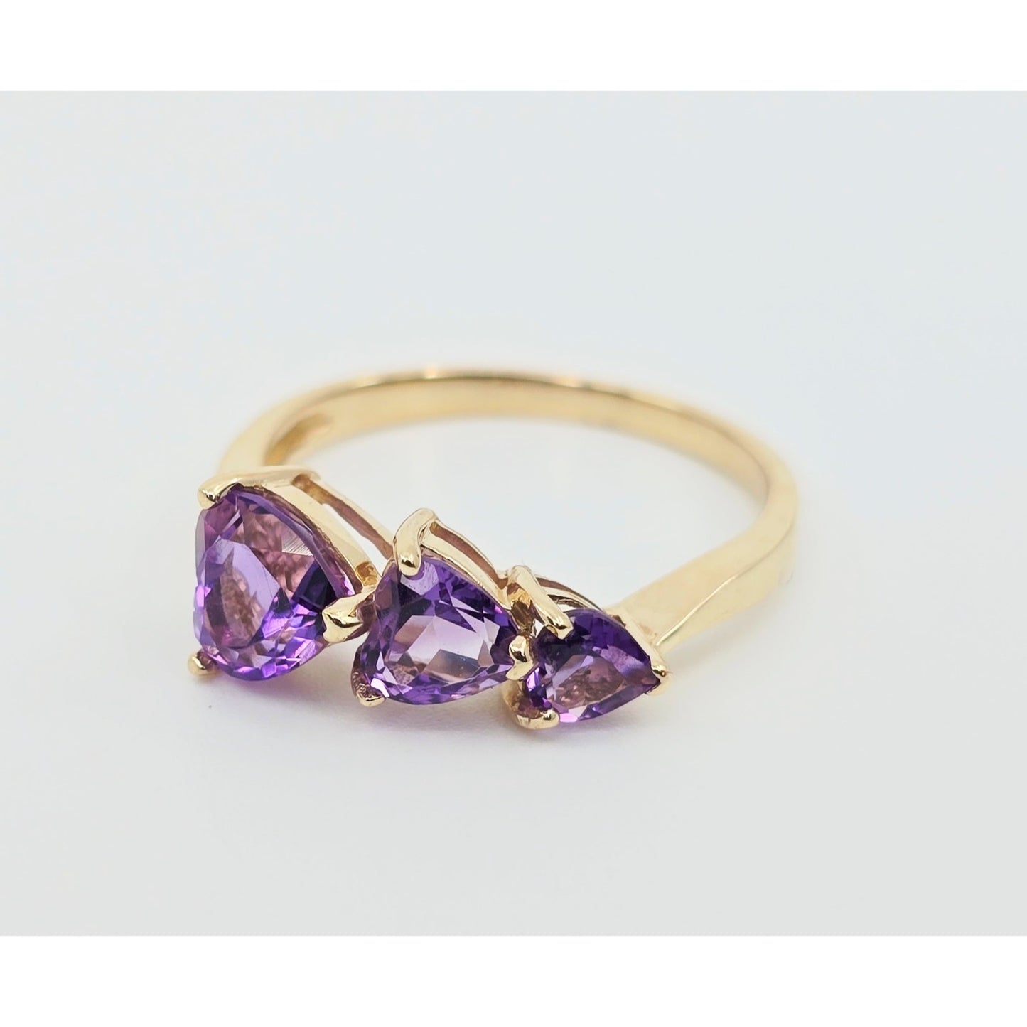 10K Yellow Gold Graduated Heart Shaped Amethyst Ring
