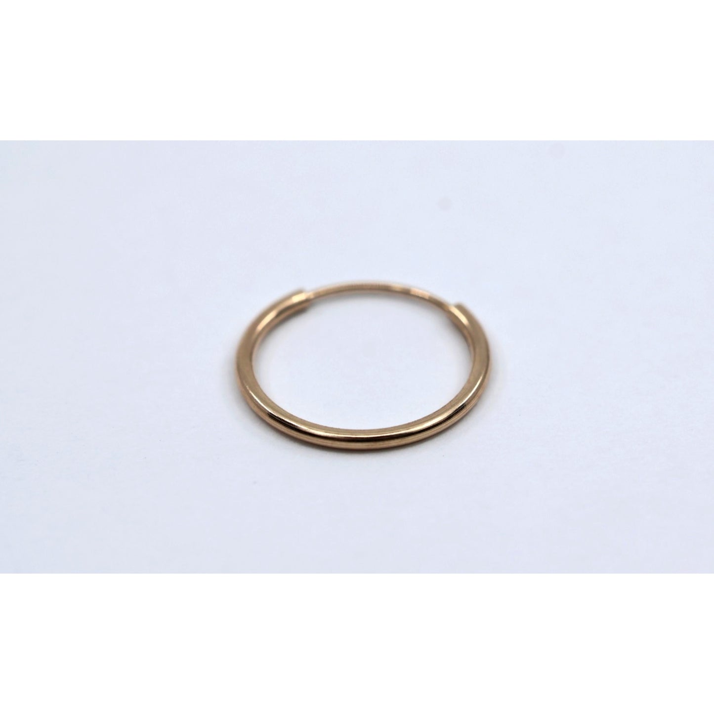 Single Tiny 10K Yellow Gold Hoop Earring