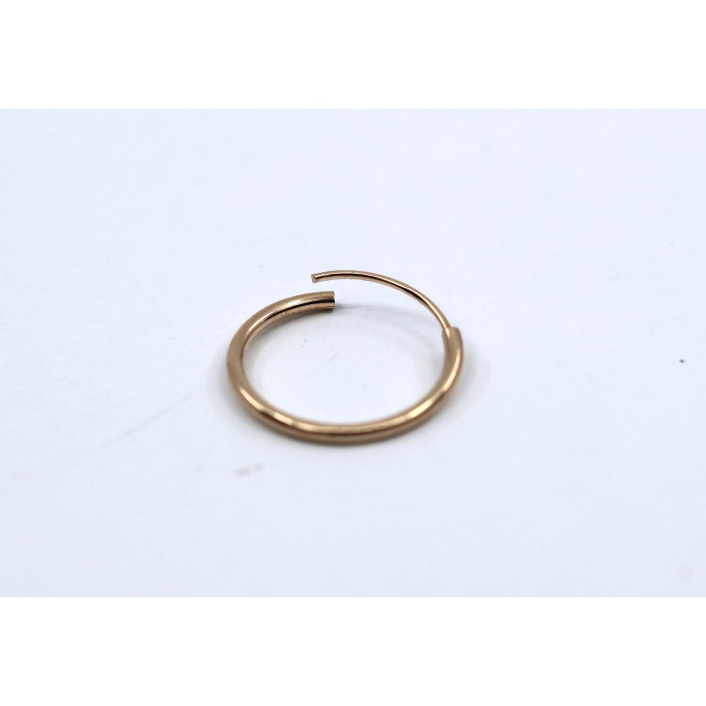 Single Tiny 10K Yellow Gold Hoop Earring