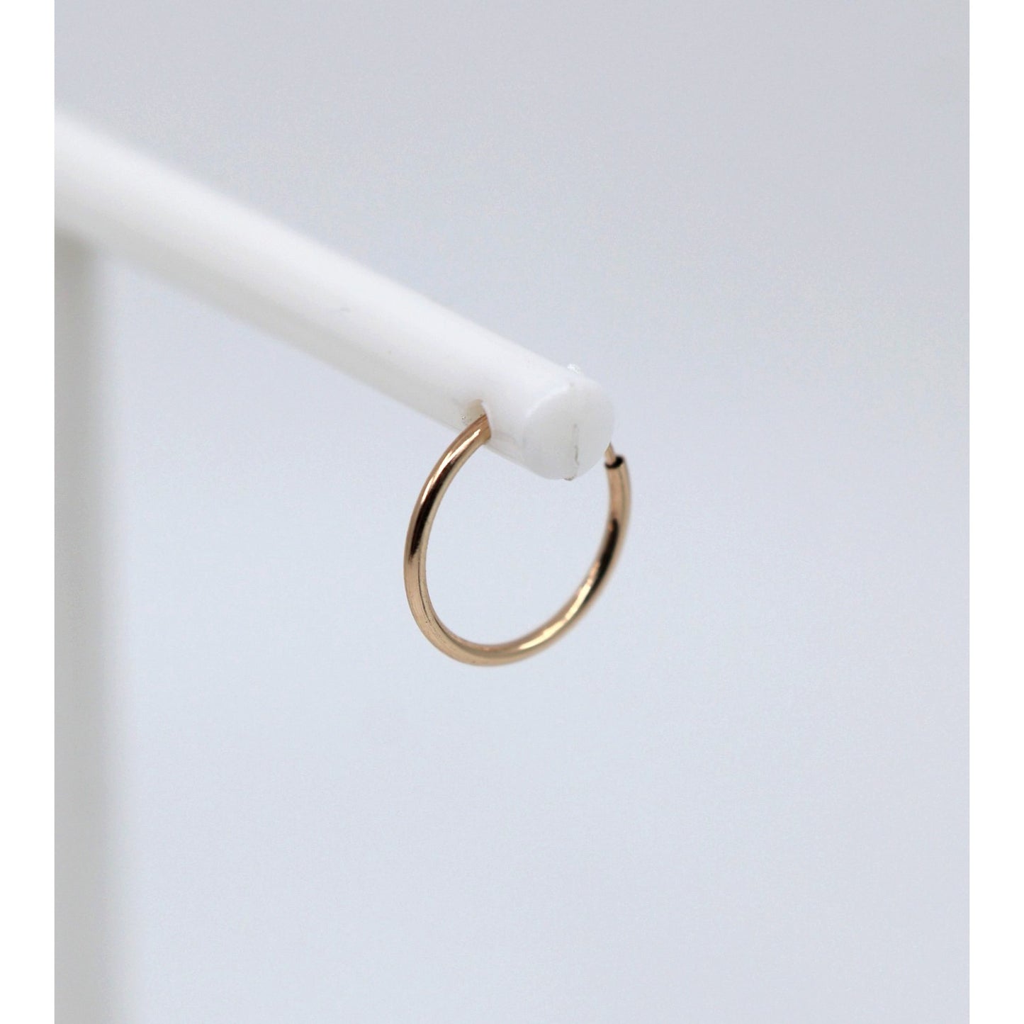 Single Tiny 10K Yellow Gold Hoop Earring