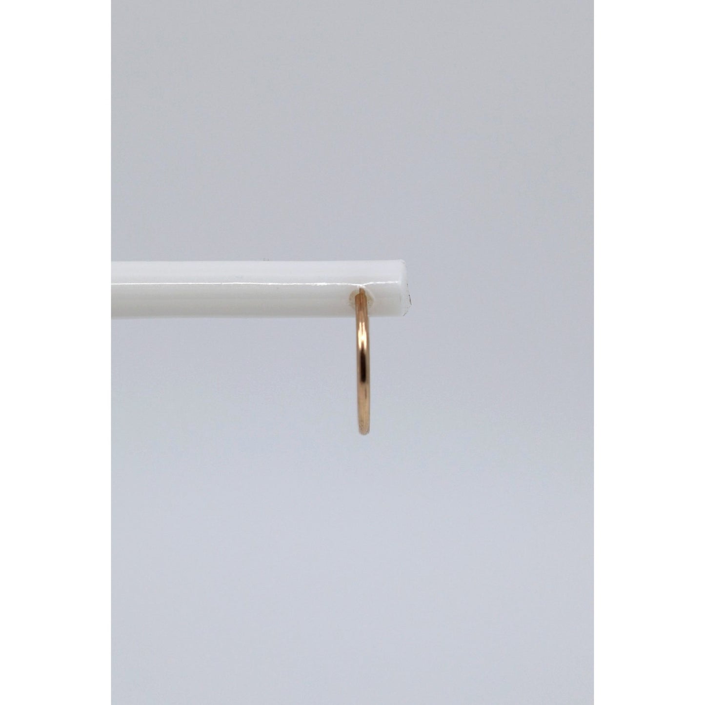 Single Tiny 10K Yellow Gold Hoop Earring