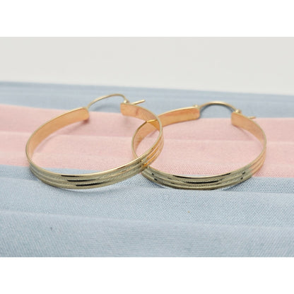 Medium 14K Yellow Gold Diamond Cut Round Hoop Earrings