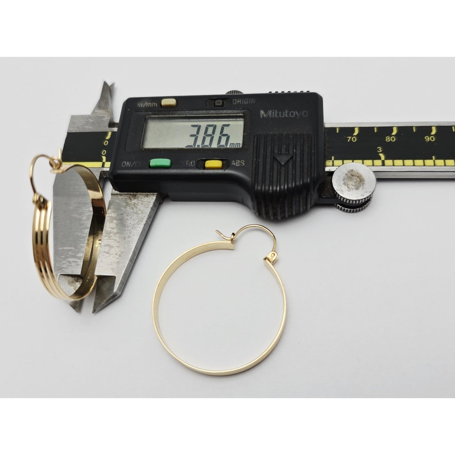 Medium 14K Yellow Gold Diamond Cut Round Hoop Earrings