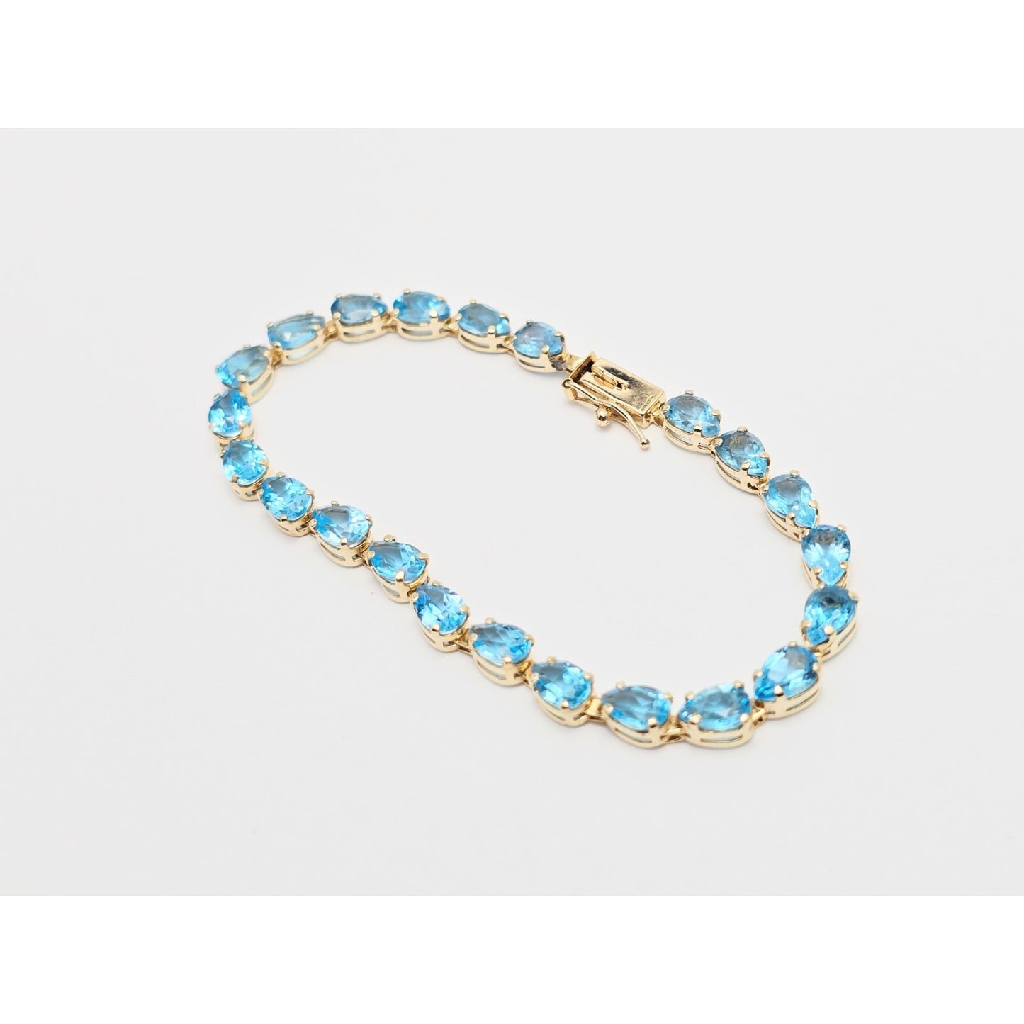 14K Yellow Gold Blue Topaz Tennis Link Bracelet