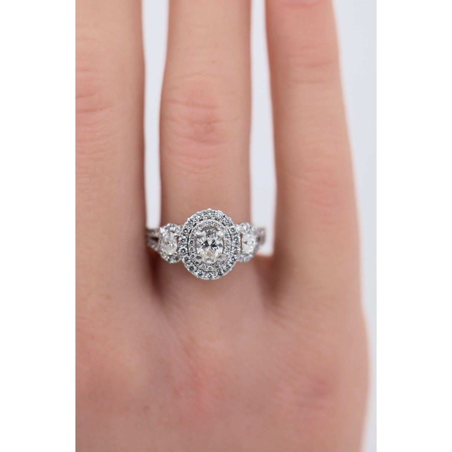 14K White Gold 1.50ct Oval Diamond Three Stone Halo Ring