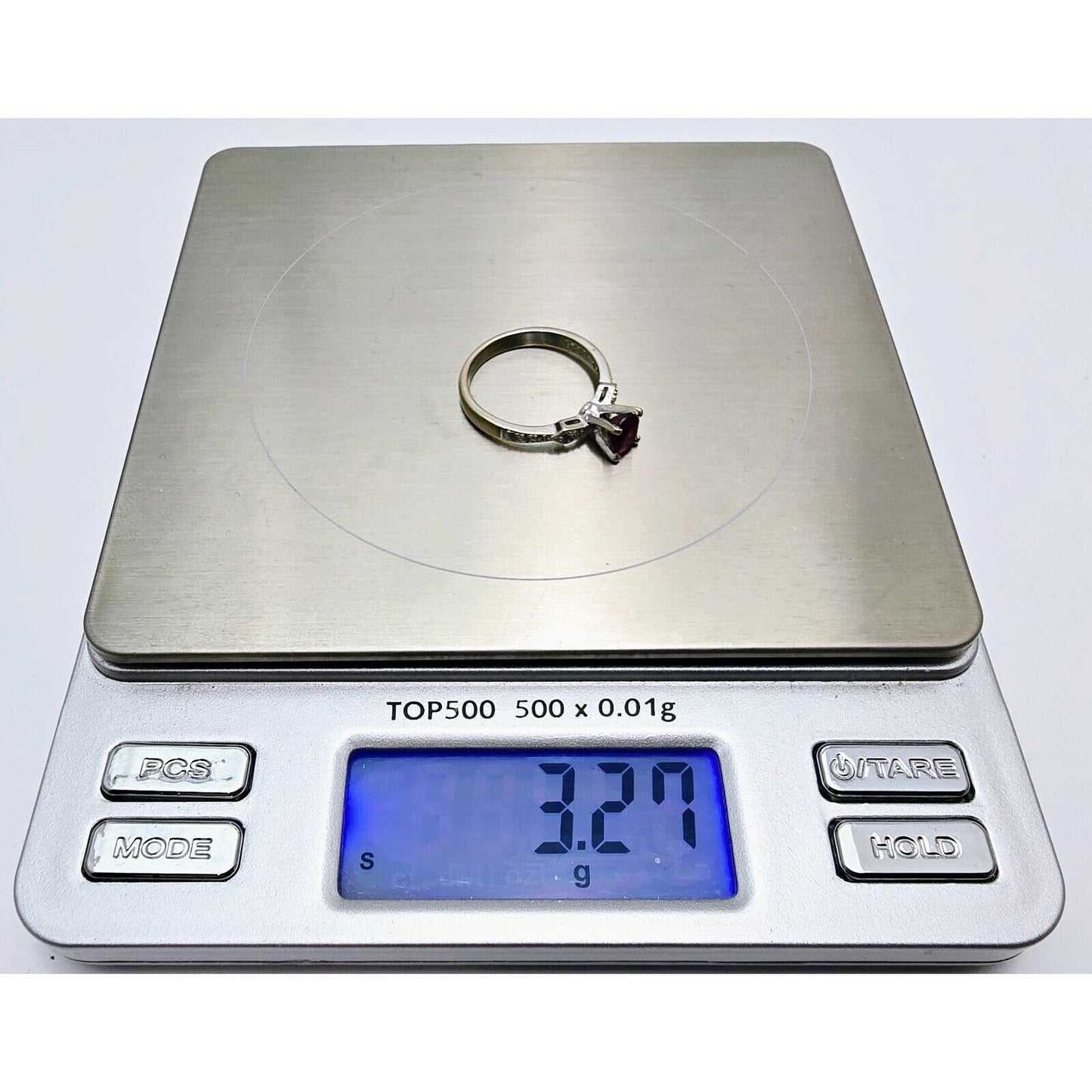 18K White Gold Ladies Solitaire Round Cut Ruby & Diamond Ring