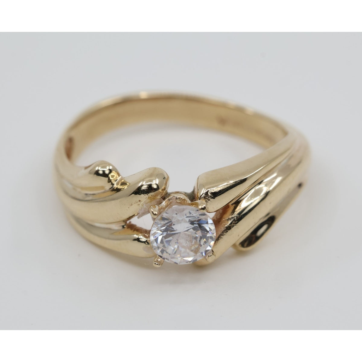 14K Yellow Gold Round Cut CZ Swirling Bypass Ring