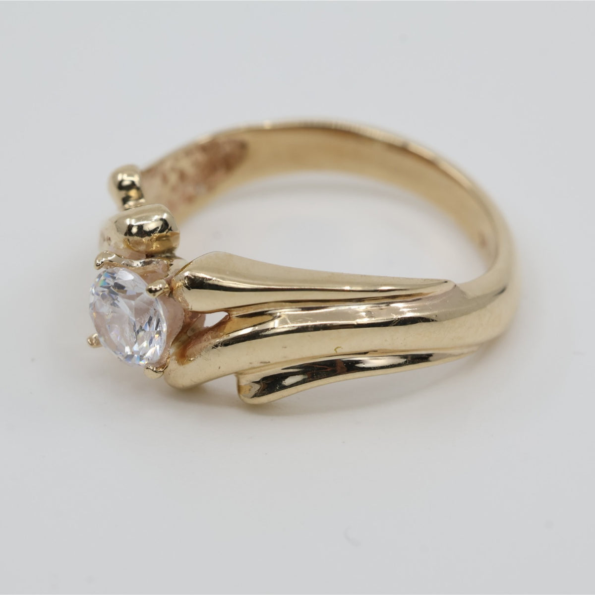 14K Yellow Gold Round Cut CZ Swirling Bypass Ring
