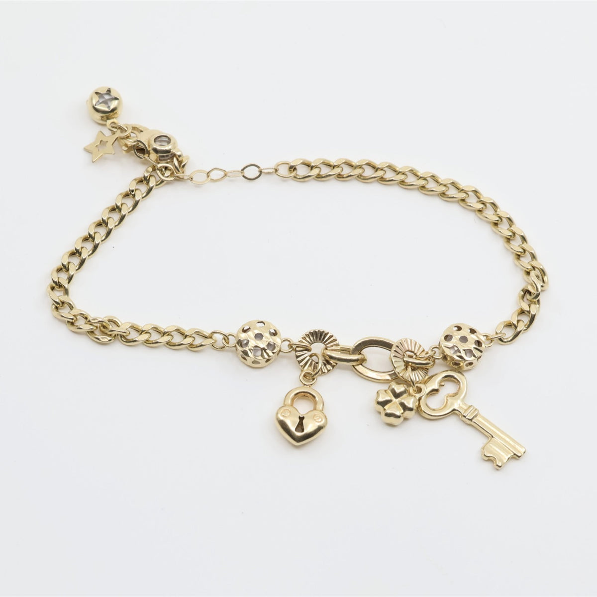 14K Yellow Gold Cuban Link Lucky Charm Key, Lock & Clover Resizable Bracelet