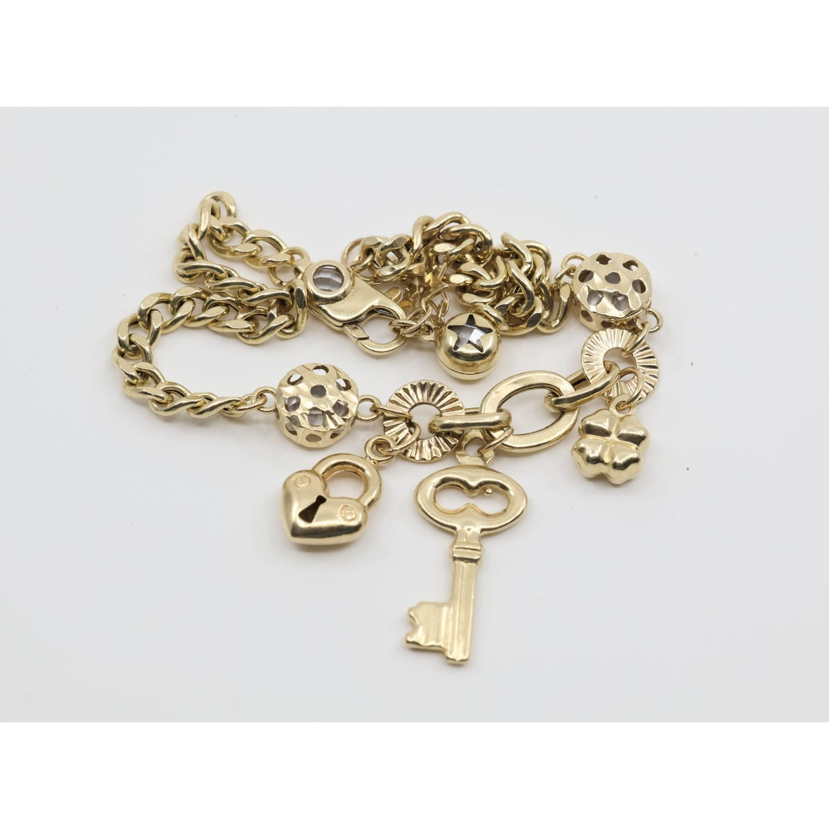 14K Yellow Gold Cuban Link Lucky Charm Key, Lock & Clover Resizable Bracelet