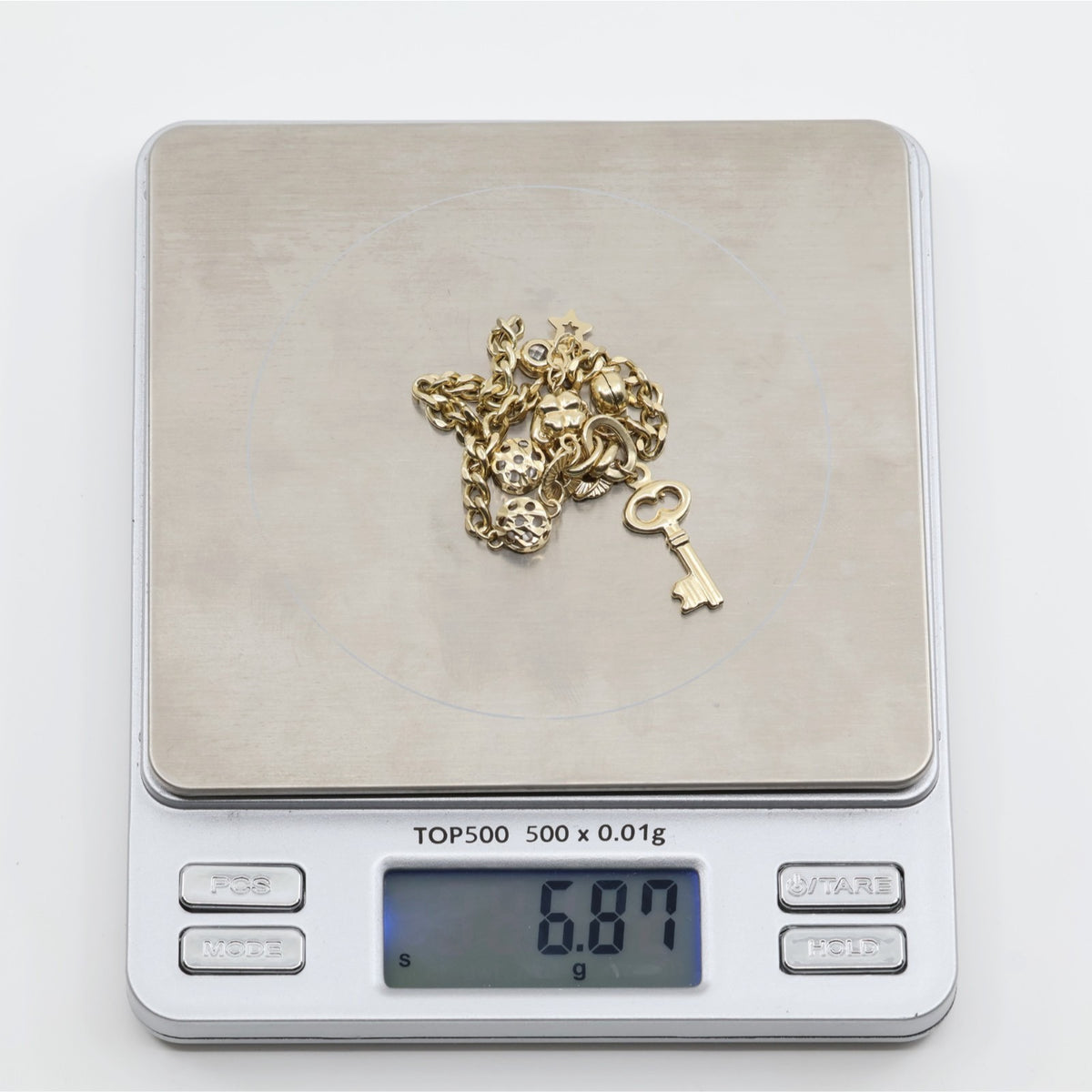 14K Yellow Gold Cuban Link Lucky Charm Key, Lock & Clover Resizable Bracelet