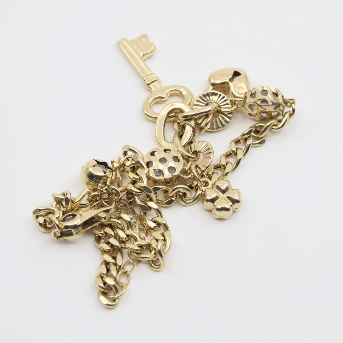 14K Yellow Gold Cuban Link Lucky Charm Key, Lock & Clover Resizable Bracelet
