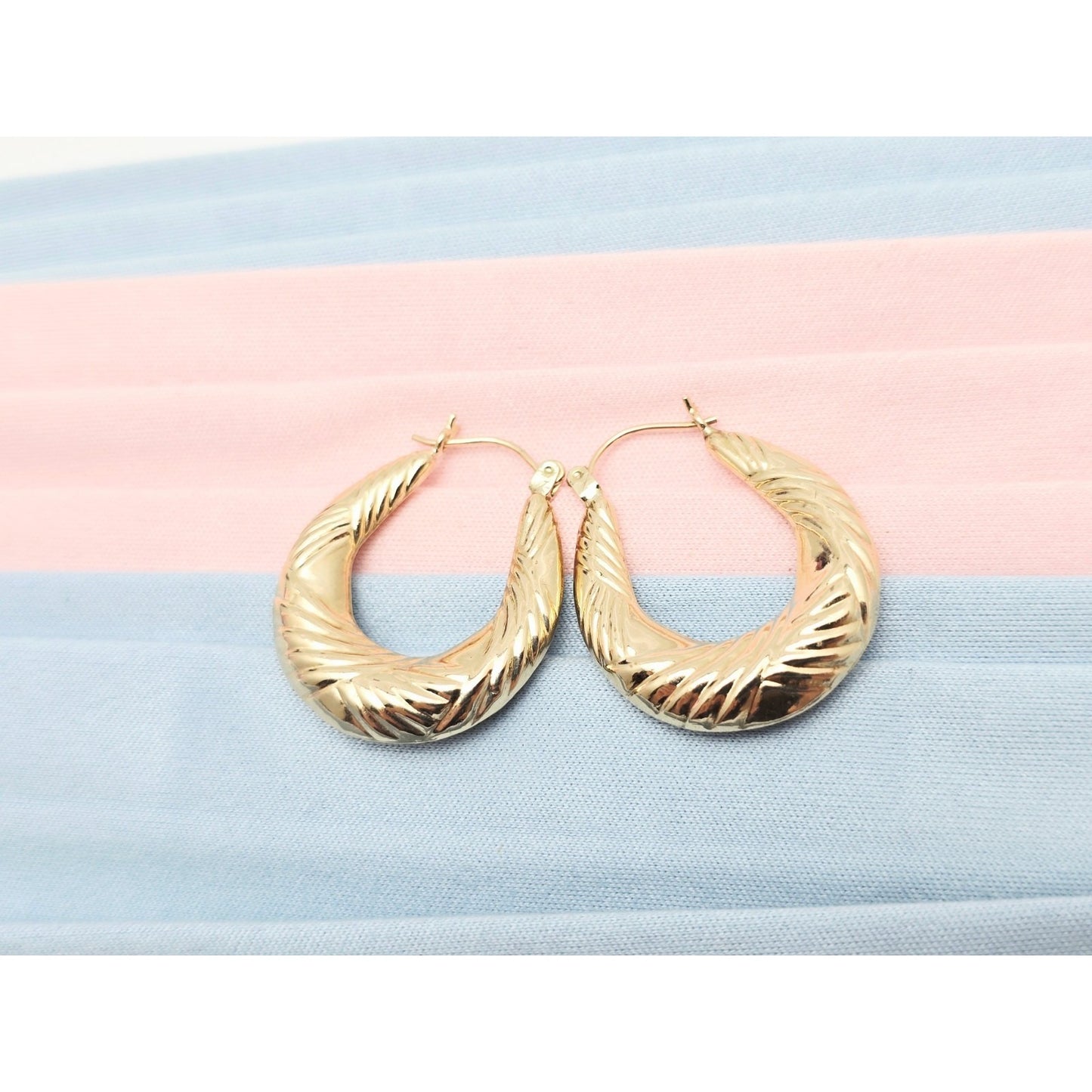 Medium 10K Yellow Gold Tapered Oval Hoop Earrings