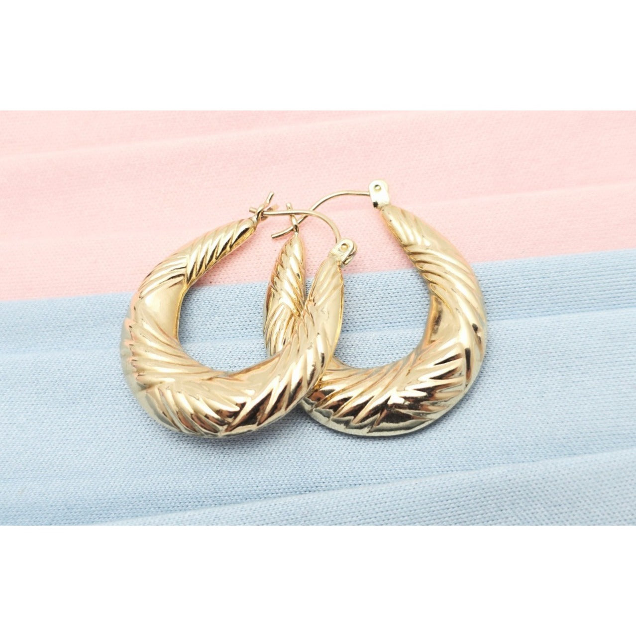 Medium 10K Yellow Gold Tapered Oval Hoop Earrings