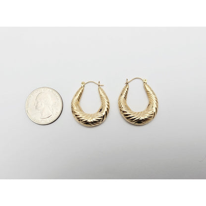 Medium 10K Yellow Gold Tapered Oval Hoop Earrings