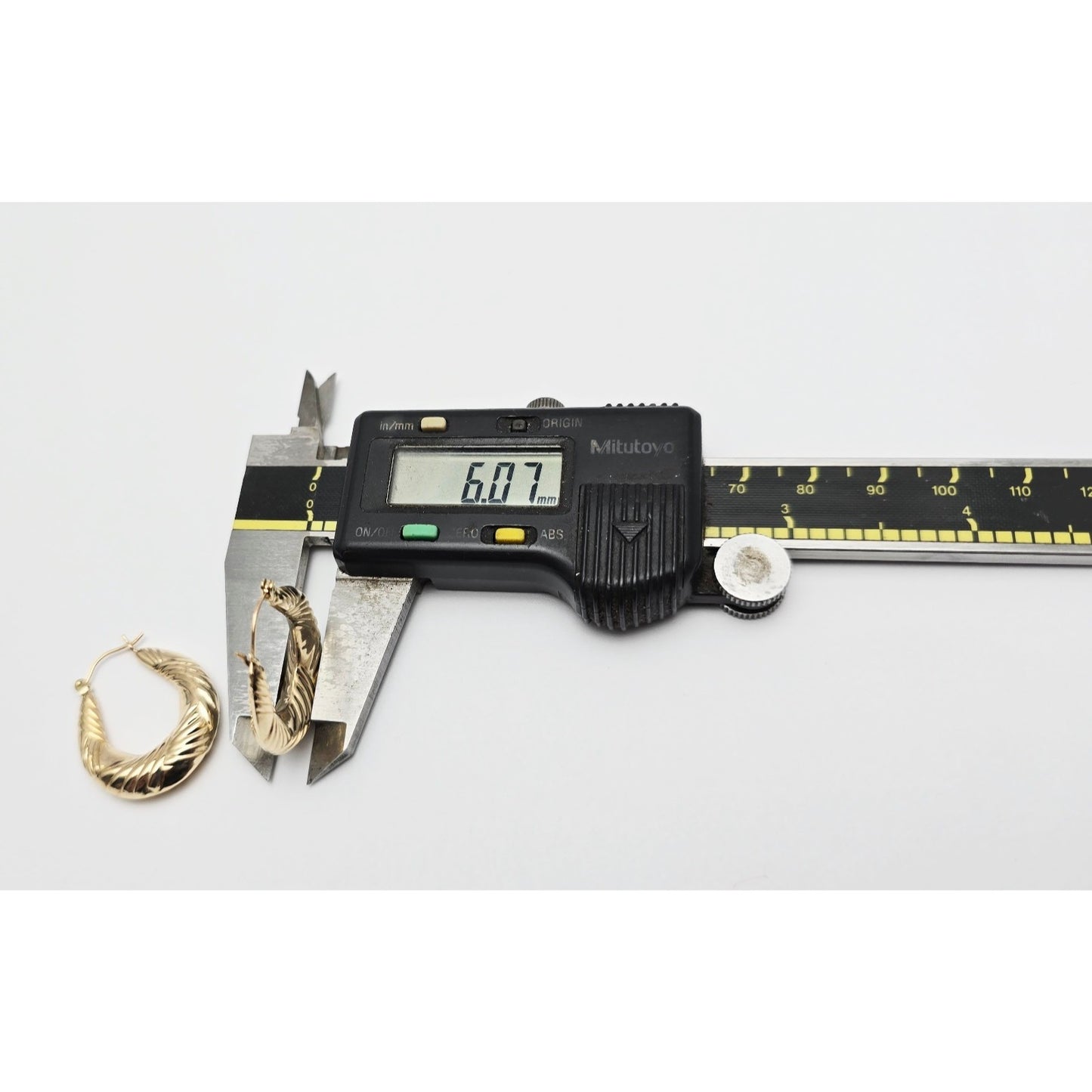 Medium 10K Yellow Gold Tapered Oval Hoop Earrings