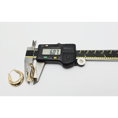 Medium 10K Yellow Gold Tapered Oval Hoop Earrings