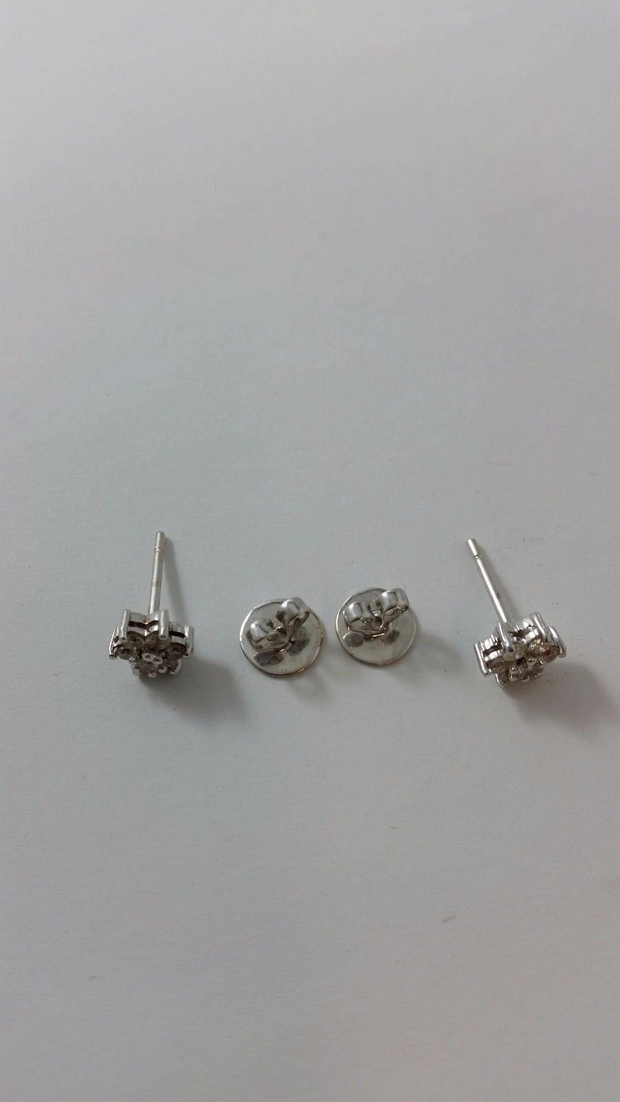 14K White Gold Designer Star Shape Diamond Earrings