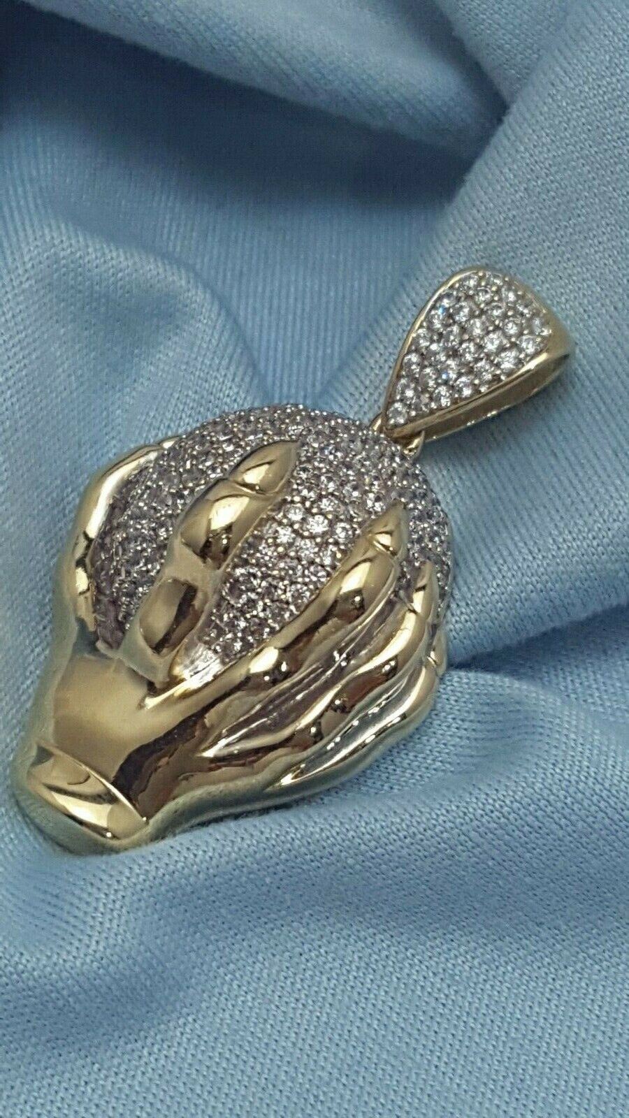 10K Yellow Gold Hand Holding Globe World Cubic Zirconia Charm Pendant